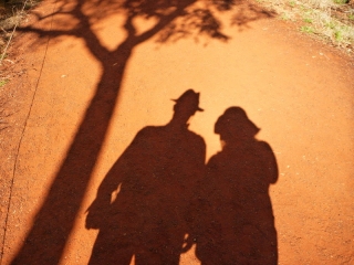 Two shadowy figures in search of a warm bed for the night