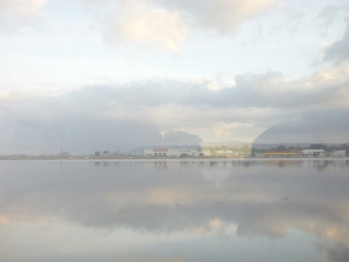 Reflections from the window of a train